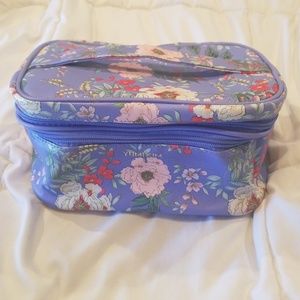 Yumi Kim makeup train case